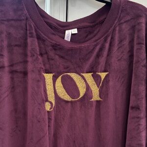 Woman’s purple Top